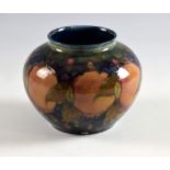 Moorcroft Pomegranate squat tapering vase, impressed and green painted marks, on base,13 cm high.