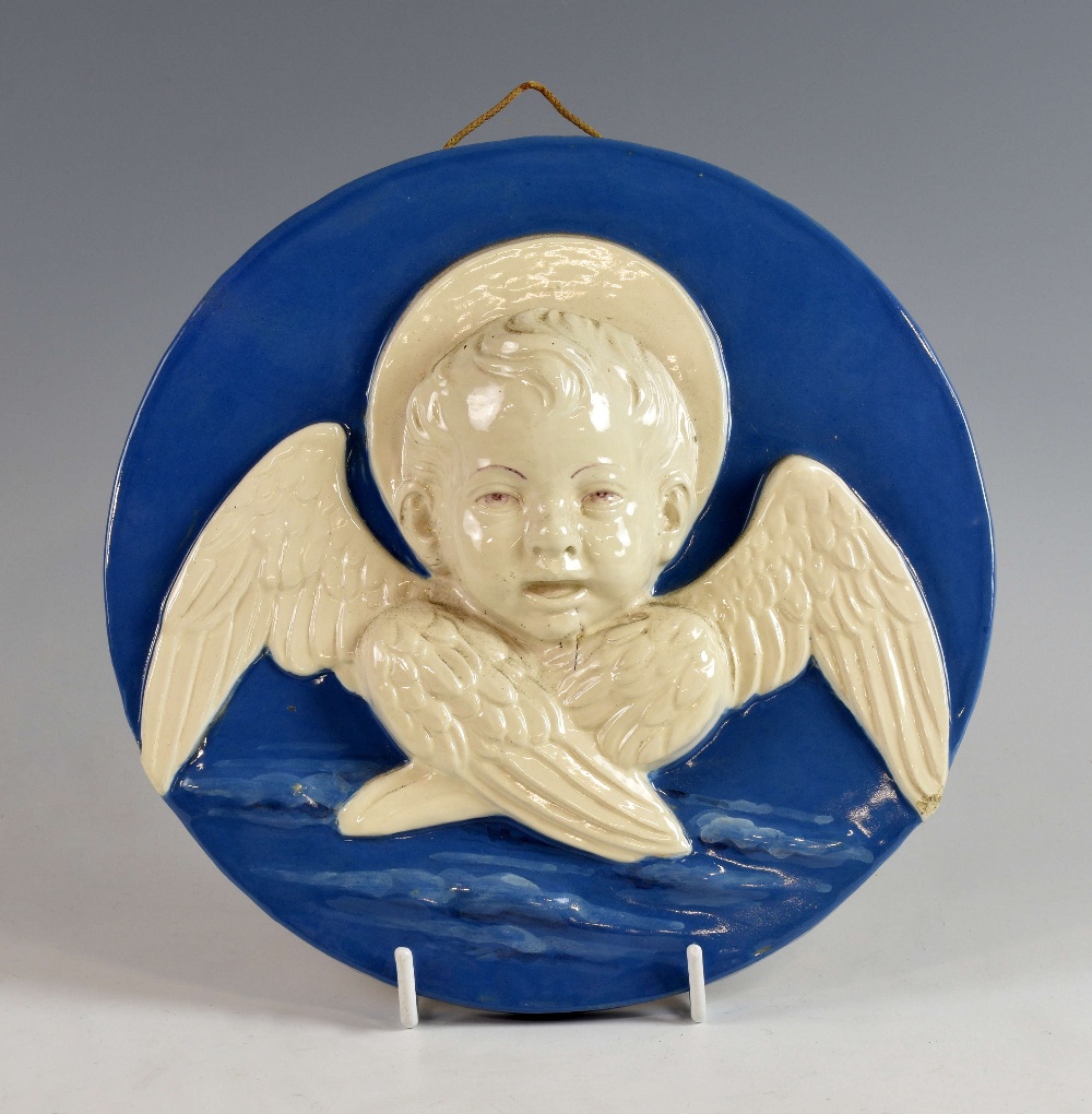 Blue and White Cantagali hanging roundel of a winged Cherub impressed Cantagali Firenze 28cm