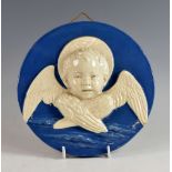 Blue and White Cantagali hanging roundel of a winged Cherub impressed Cantagali Firenze 28cm