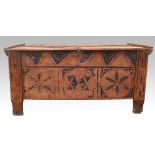 CHANGE OF ESTIMATE An oak plank top coffer with pen work star and flower decoration, 55 x 104 x 50