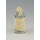Doulton an early Leslie Harradine stoneware figure of a Dutch lady, in blue and white dress,
