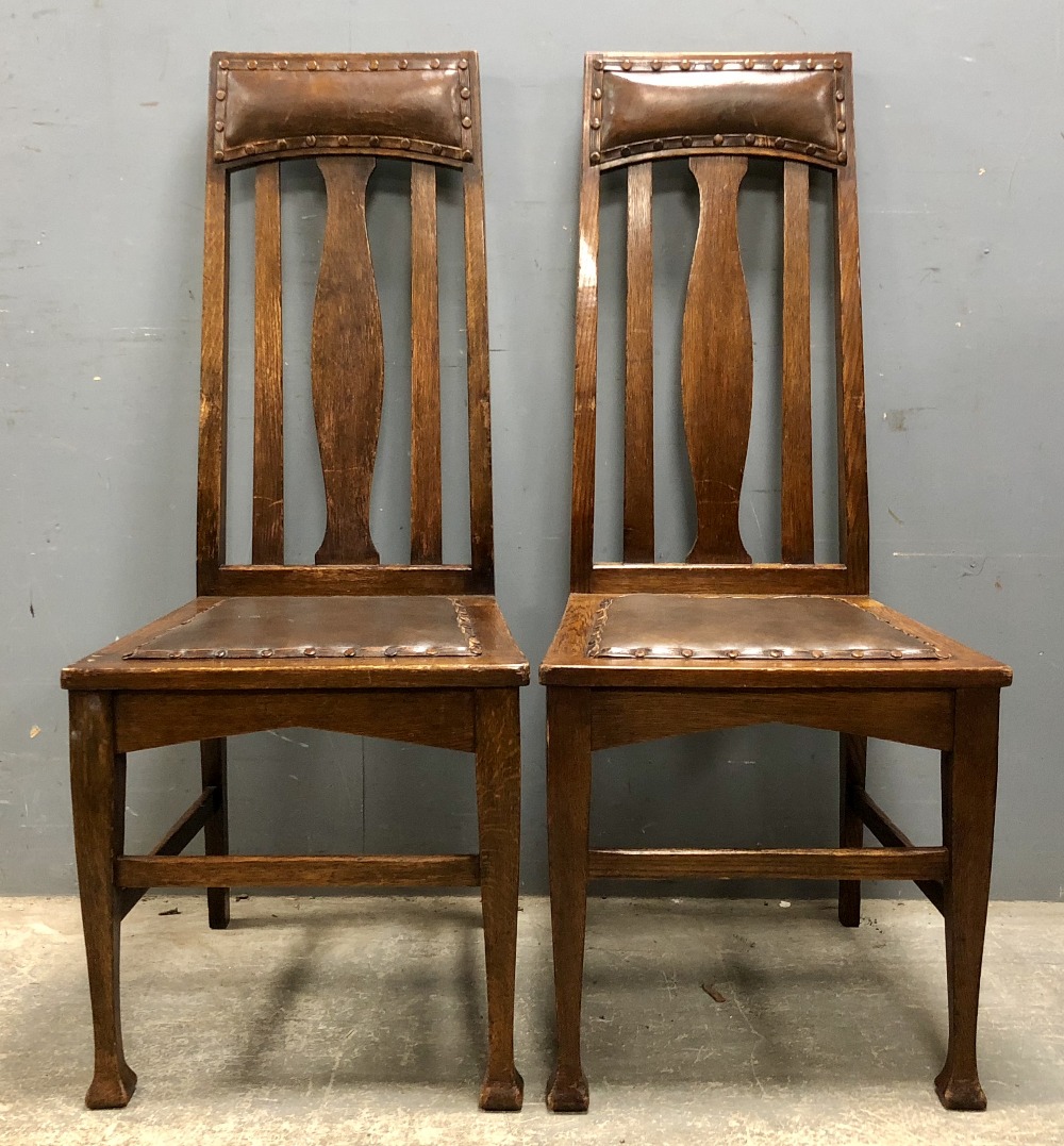 Set of ten oak dining chairs including two carvers Arts and Crafts influence design with upholstered - Image 2 of 2