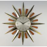 Mid century sunburst wall clock by Metamec, dial 21 cm diam., widest point 61 cm diam. .