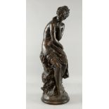 After Auguste Moreau, bronze figure of a semi clad maiden seated and holding flowers, signed in the