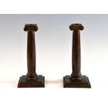 Pair of American copper candlesticks by Gorham on bronze square step base supports. 26cm high.