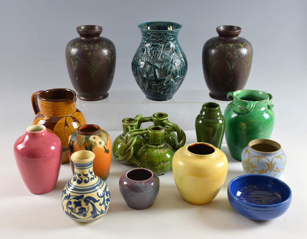 A Collection of fourteen Art pottery vases and bowls to include a pair of Lovatts Langley