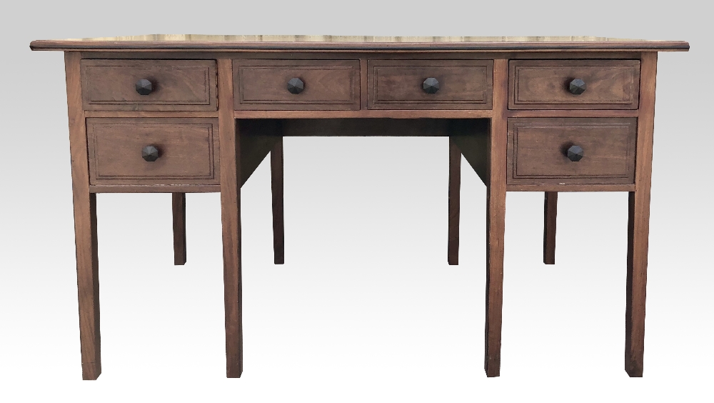 Cotswold School walnut kneehole desk, attributed to Peter Waals, six drawers, with octagonal