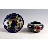 Moorcroft pansy bowl, pale pink to mauve flowers on a blue ground, impressed signature and Potter to