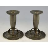Liberty & Co Tudric, pewter candlesticks, designed by Archibald Knox, conical form on three