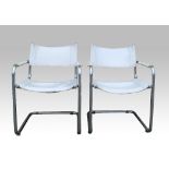 Set of four chairs Bauhaus style chairs in chrome and white leather, 1960-1970's production .