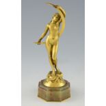 J. Dorval, bronze figure of a nude maiden holding a crescent moon, on octagonal onyx and gilt