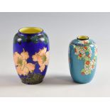 A Royal Doulton ovoid vase decorated with poppies on a solid blue ground, printed marks, 16cm