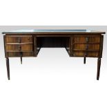 Lazlo Hoenig, Austro Hungarian, 1905-1971, a mid 20th C rosewood veneered desk with concave shaped