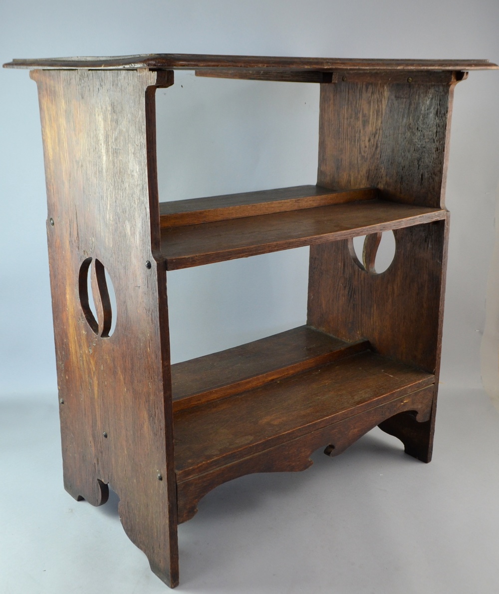 Oak Art Nouveau bookcase on square legs..