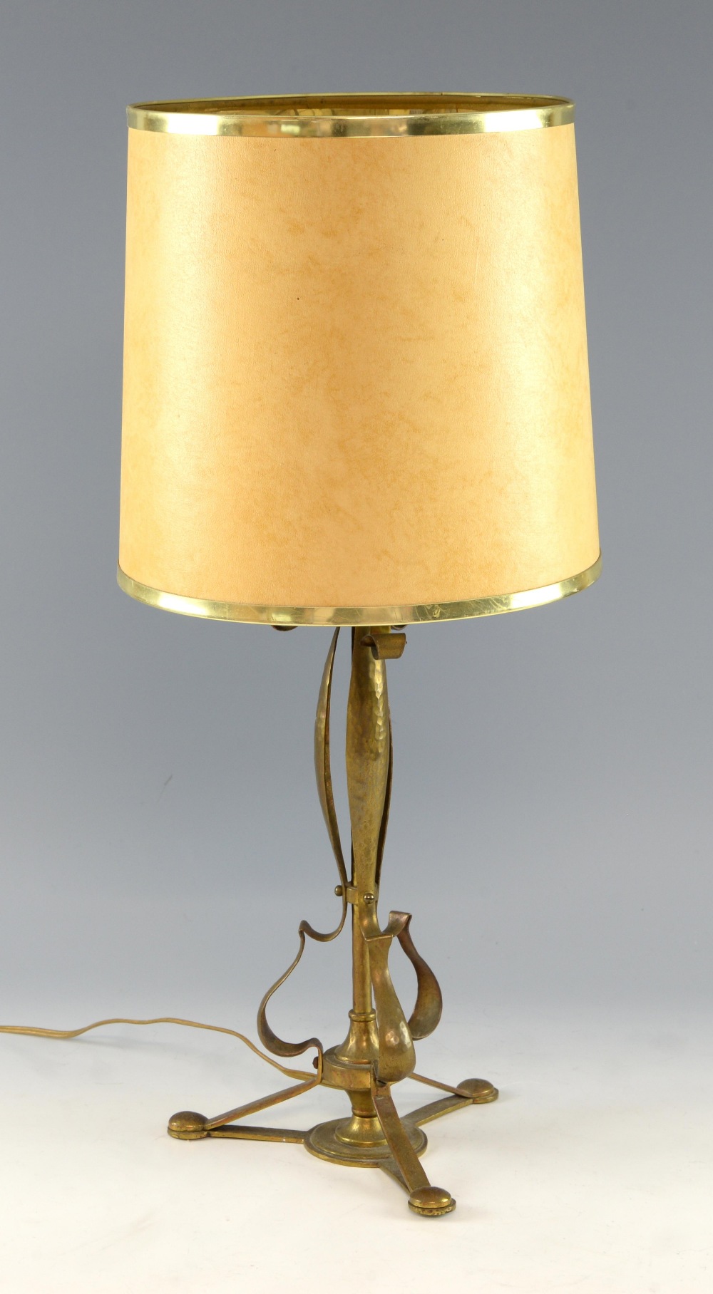 A brass table lamp with hammered finish 36cm.