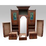 Expanded description and revised estimate, An Arts & Crafts oak compactum wardrobe, by Shapland &