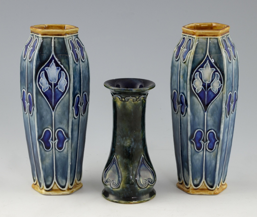 Doulton Lambeth, a pair of hexagonal form vases with Art Nouveau style decoration, tube-lined design