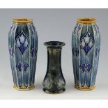 Doulton Lambeth, a pair of hexagonal form vases with Art Nouveau style decoration, tube-lined design