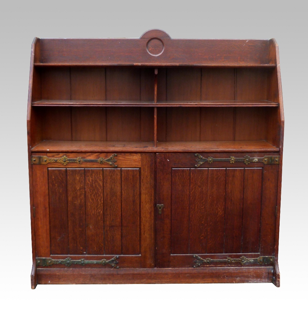 Late 19th C Oak bookcase cabinet, with brass strap hinges, 155 x 155 x 30cm . Stains, water marks