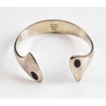 Hans Hanson vintage silver open bangle, sculptural form with black enamel ovals mid 20th C .