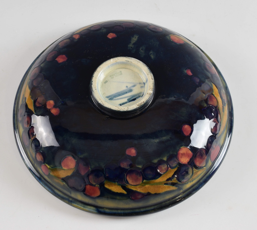 Moorcroft pottery, a Pomegranate shallow bowl on small reeded foot, stamped, and marked in blue on - Image 2 of 2