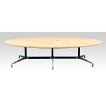 Charles Eames, a Vitra triple table base, with associated section oval top in burr maple, length