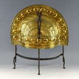 Arts and Crafts fire screen domed front with palm leaf pattern, copper studs, wrought iron base