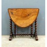 Victorian walnut oval drop flap tea table on bobbin turned legs, 55 x 55 cms.