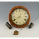 Weight driven mahogany wall clock the 30 hour movement striking on a bell, 32cm..