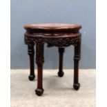 Chinese rosewood circular table with marble top 47cm high, diameter 42 cm.