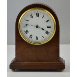 Mahogany cased timepiece, the white enamel face with Roman numerals, 17.5cm high, 14.5cm wide, 6.5cm