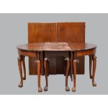 19th century mahogany extending dining table centre section with drop leaves flanked by Demi lune