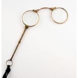 A pair of Victorian gold lorgnettes, stamped 9 ct, handle measuring approximately 9cm in length, in