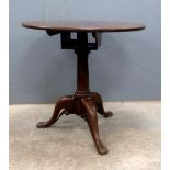 George III mahogany tilt top tripod table, on column sport to tripod base, 72cm (height) x 76cm (