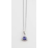 Tanzanite cluster pendant, central trillion cut tanzanite, estimated weight 0.92 carats, set