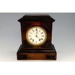 Walnut case mantle clock, the eight day movement striking on a gong, 31cm height..