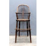 Early 20th century elm Windsor childs high chair, 92cm .