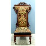 Victorian carved mahogany Prie Dieu chair with floral Berlin woodwork panels 136cm high. Provenance: