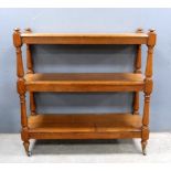 Early 20th century oak three tier buffet on brass and pottery casters, 100cm x 103cm. Provenance: