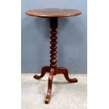 19th century mahogany circular mahogany table on tripod legs and bobbin turned column, diamter 53cm.