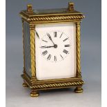 Early 20th Century brass and glass carriage clock with lever escapement.