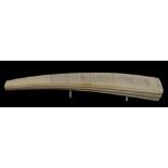 19th century walrus tusk carved cribbage board, 31cm long,.