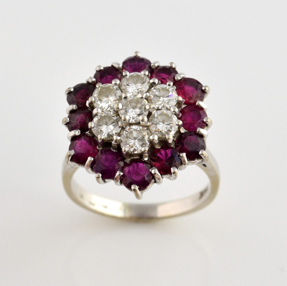 Vintage ruby and diamond cluster ring, set with seven round brilliant cut diamonds, estimated - Image 2 of 2