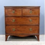 George III mahogany chest of two short over two long drawers on splayed bracket feet, brass ring