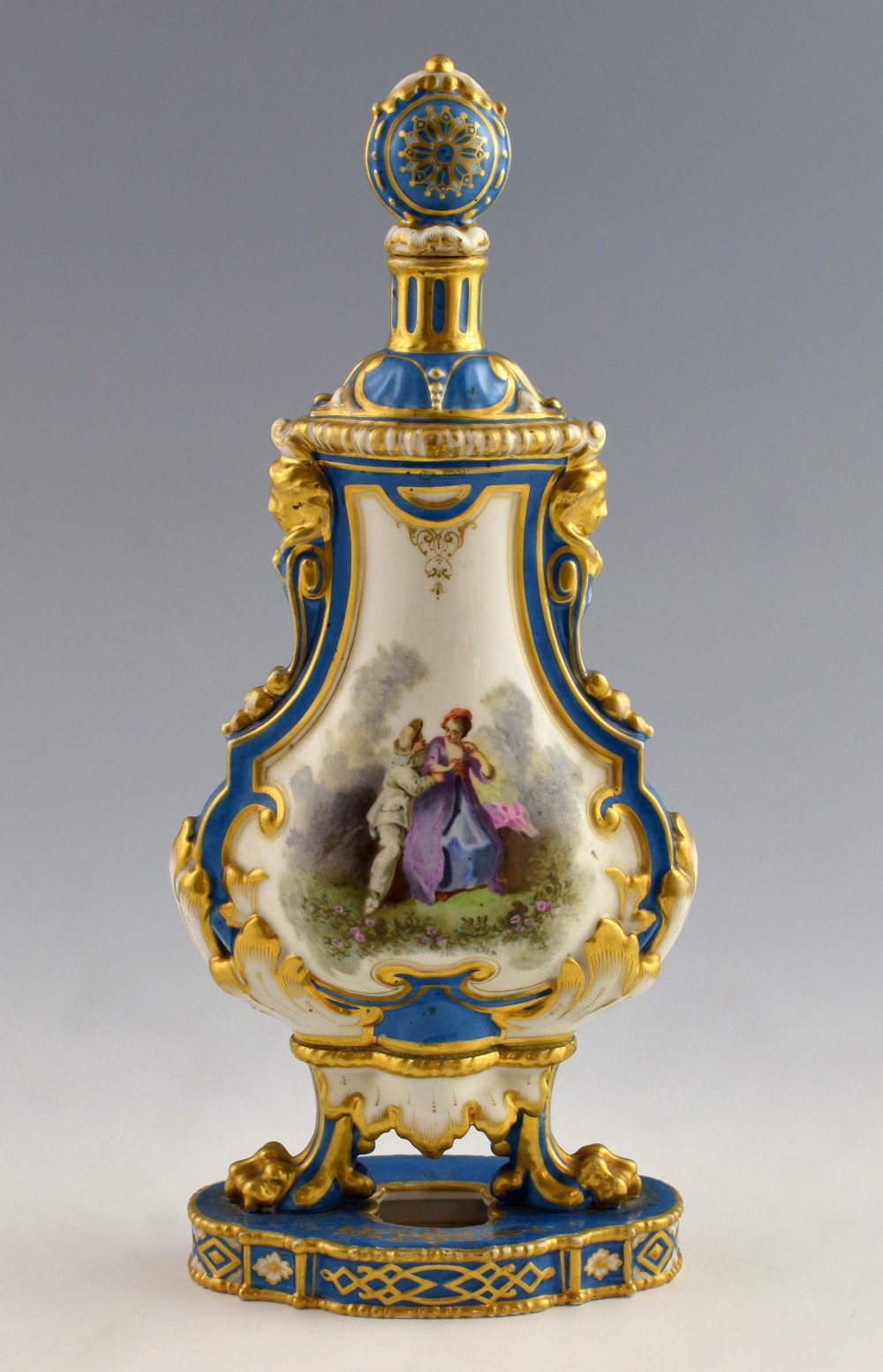 Sevres style vase and cover, blue ground painted with figures and highlighted in gilt..