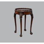 Circular mahogany silver table stamped Gillows and numbered 74523, the cabriole legs with claw and