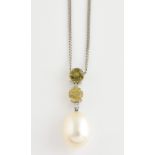 Yellow sapphire and pearl drop pendant, two round cut sapphires, estimated total weight 1.22 carats,