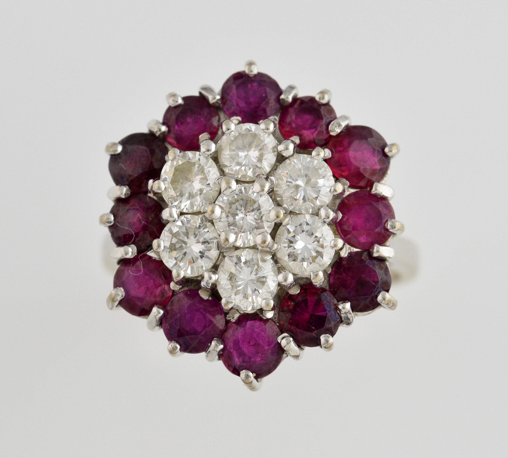 Vintage ruby and diamond cluster ring, set with seven round brilliant cut diamonds, estimated