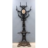 19th century cast-iron hallstand. 180cm high . Over painted and with oxidization, finial and one