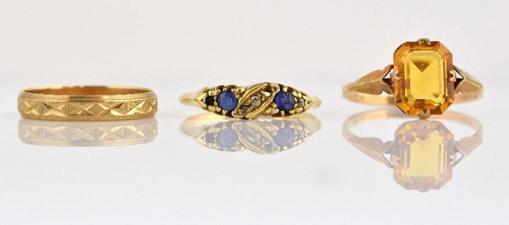 Three gold rings, sapphire and diamond, 18 ct Birmingham 1901, and two 9 ct rings, citrine set and